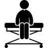 Person sitting on a medical stretcher