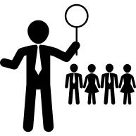 Business leader holding magnifying glass with other workers on background