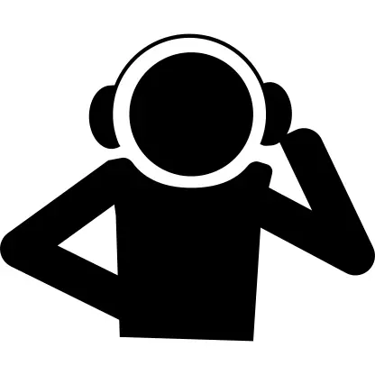 Teenager listening music with headphones