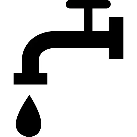 Faucet side view with falling drop of water