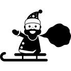 Santa Claus with a gifts bag standing on a sled