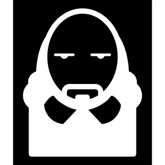 British man with long hair and beard