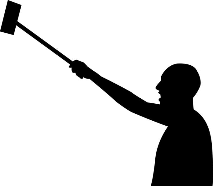 Man with hammer silhouette