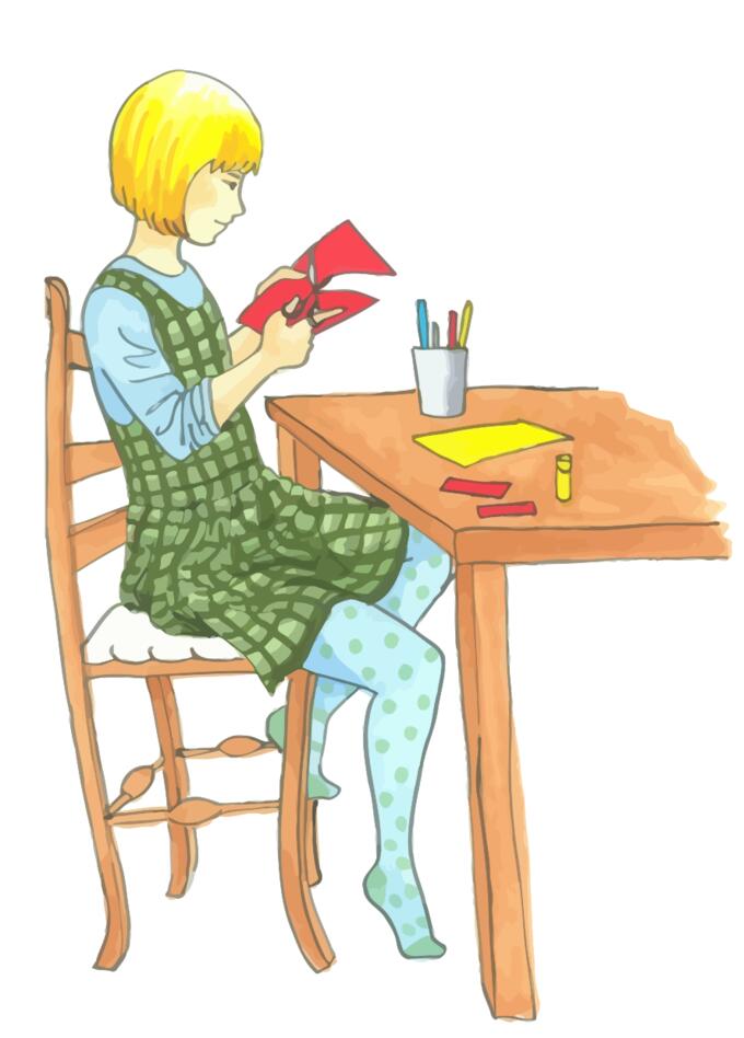 Blonde girl doing Crafts At A Table