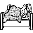 Bear sleeping in a bed