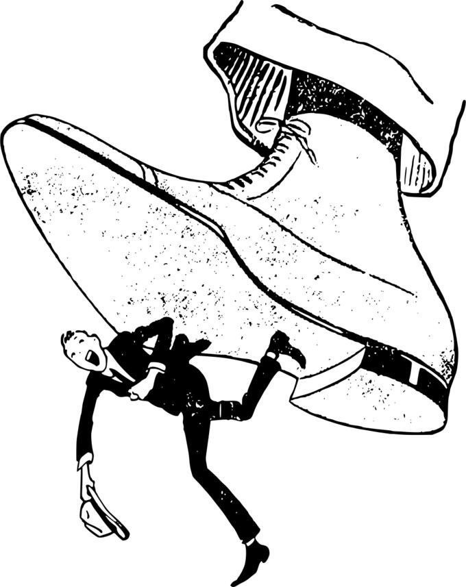 Man underneath a shoe
