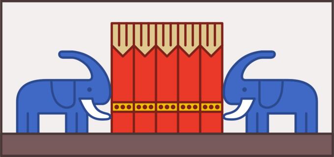 Two elephants in front of circus tent image