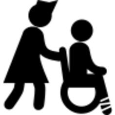 Nurse behind a wheels chair carrying a child with broken leg