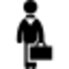 Businessman standing with bow tie and suitcase