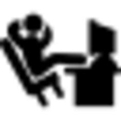 Comfortable office worker with his legs lying on the desk