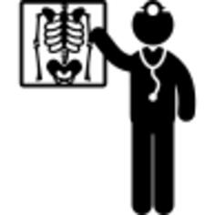 Medical doctor standing beside x ray