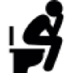 Man sitting in the bathroom