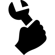 Hand holding up a wrench