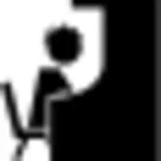 Student on piano in music class from side view