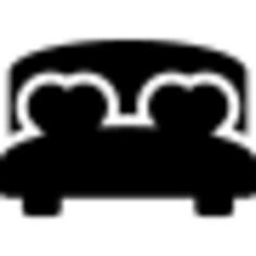 Double bed with heart cushions