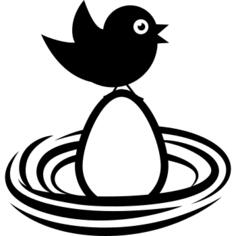 Bird on an egg in a nest