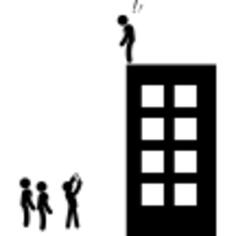 Suicide man standing on top of a building and a group of persons down on the street observing while one of them is taking him a picture to share