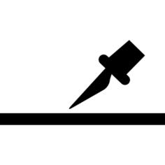 Calligraphy pen tip about to write on paper