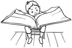 Boy reading a big book
