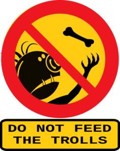 Vector clip art of do not feed the trolls sign with caption